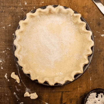 gluten free vegan pie crust in pan before baking on the kitchen table