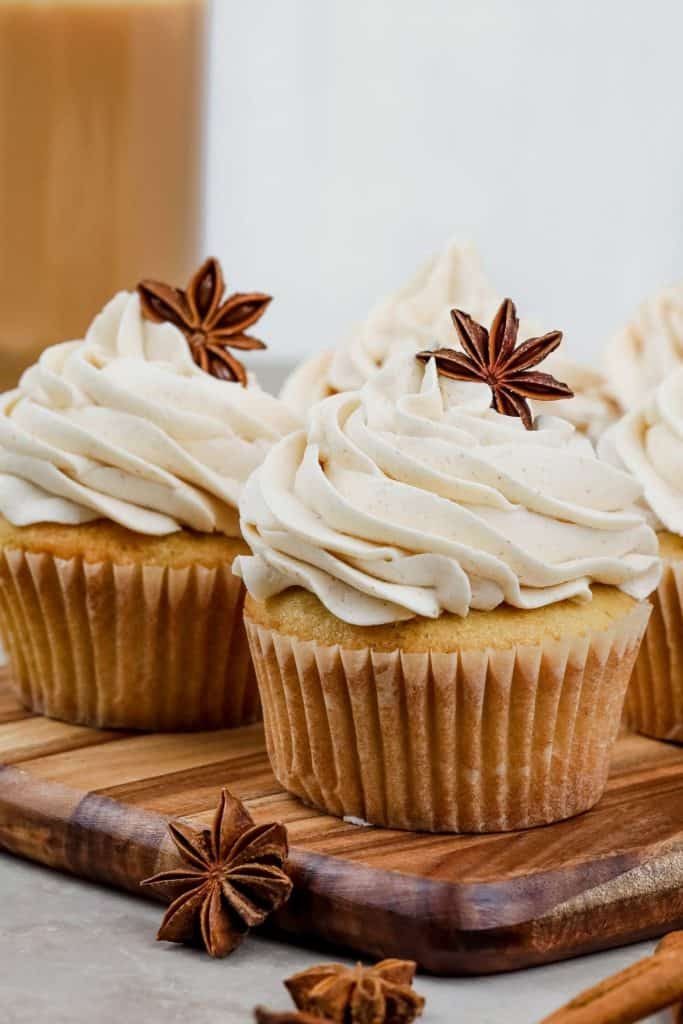 chai cupcakes on a wood board 