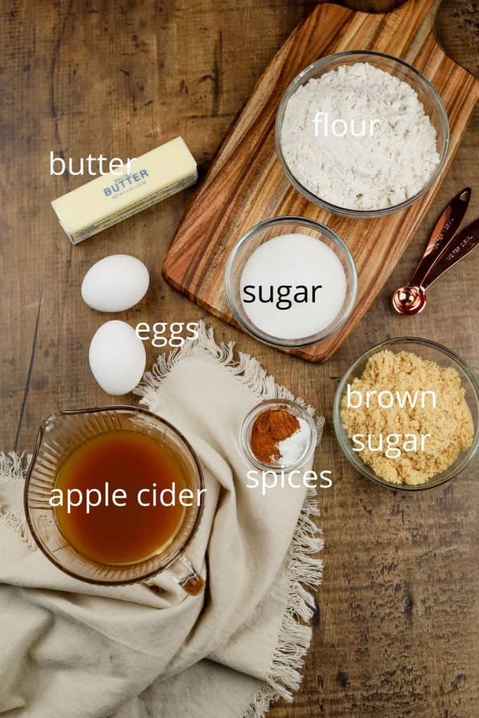 all the ingredients needed to make apple cider cupcakes on the kitchen countertop