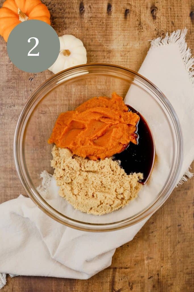 pumpkin, sugar, and molasses in a glass bowl on the tabletop