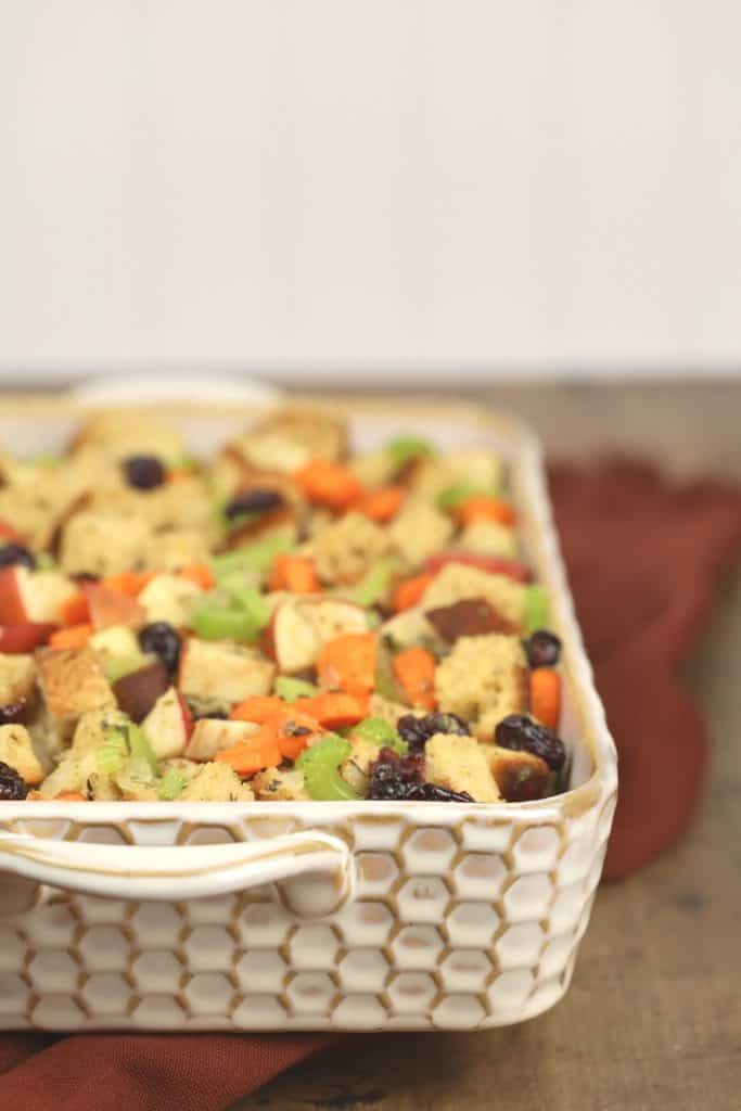 side view of baked fruit stuffing in baking dish