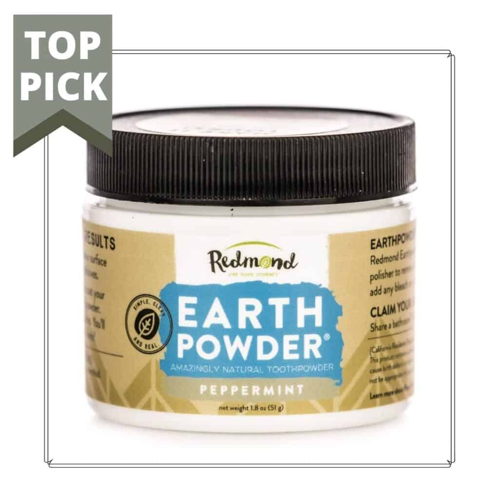 jar of earth powder toothpaste with a small sign that says top pick