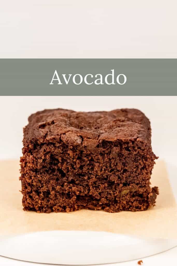 an avocado brownie on a white plate