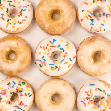 overview of 9 egg free vanilla donuts with sprinkles