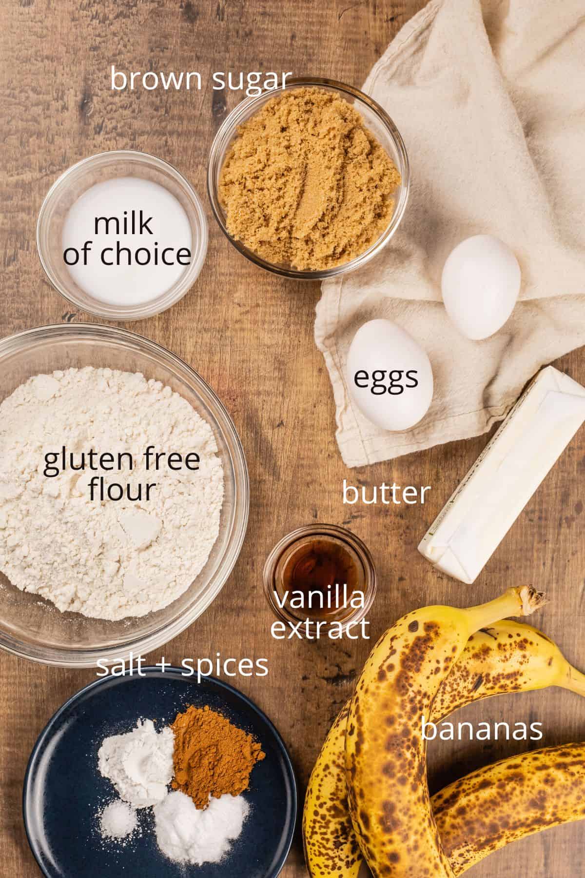 ingredients for gluten free banana muffins in various glass bowls on the kitchen table