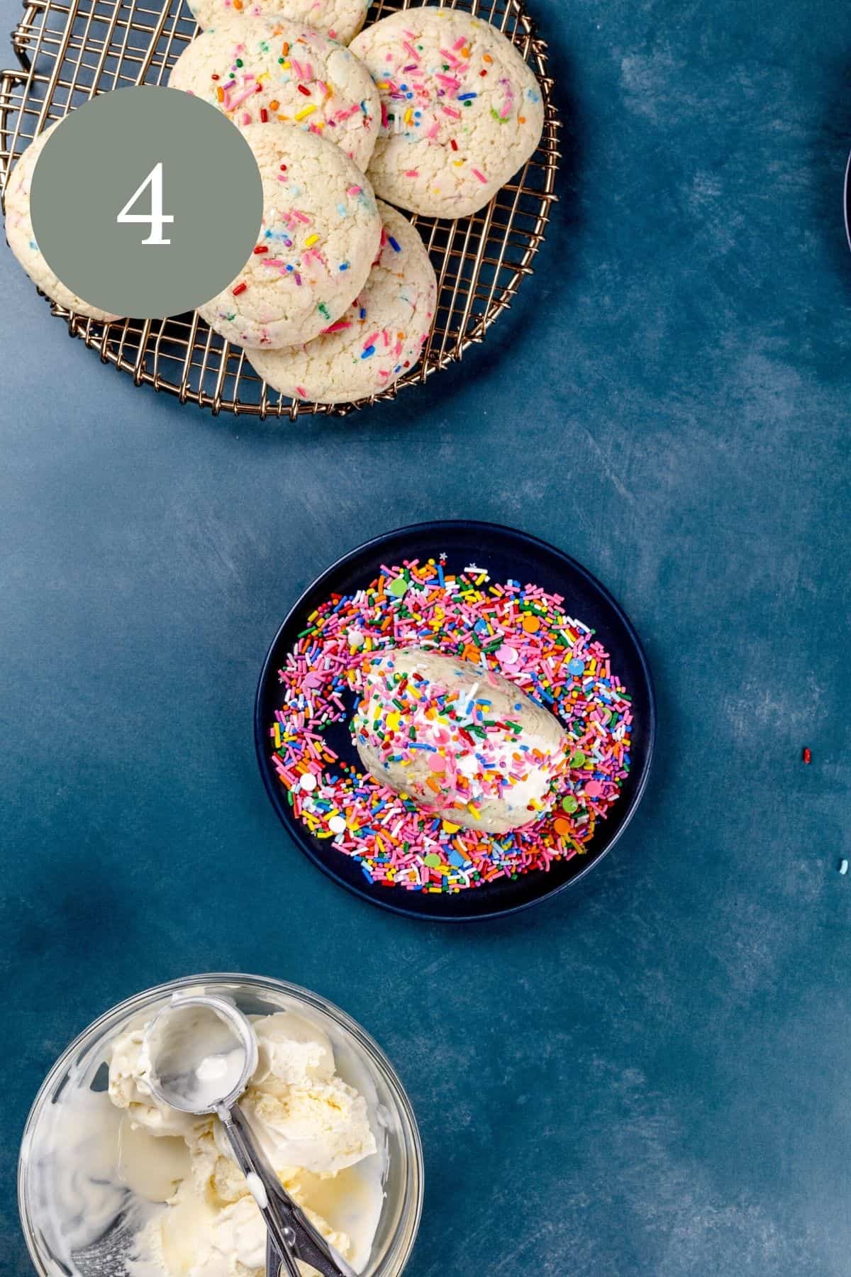 the finished confetti ice cream sandwich is being rolled on a plate filled with rainbow sprinkles while more cookies and a bowl of vanilla ice cream surround the cookies