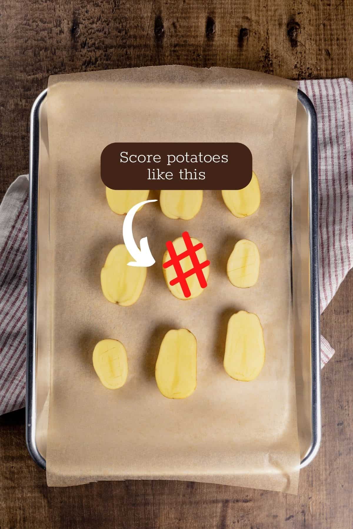 9 halved potatoes on a baking sheet with a hashtag and text describing where to cut the potatoes.